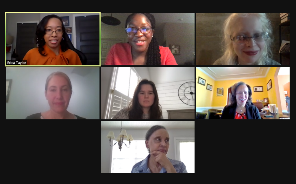A virtual meeting screenshot showing seven people in individual boxes, all participating in an online video call. The background of each varies, featuring home and office settings. Some are smiling, and one is speaking.