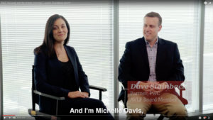 Two people are seated in chairs in a well-lit room. The woman on the left is wearing a dark suit, smiling. The man on the right, with short hair, is in a suit with a red overlay identifying him as Dave Stainback, Partner at PwC and AVLF Board Member.
