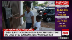 A woman and child stand outside a building entrance, with the woman pressing buttons. The image includes a news graphic about the coronavirus pandemic, highlighting concerns about rent confidence among Black renters.