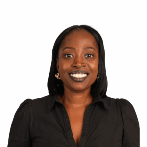 A woman with straight black hair smiles at the camera, wearing a black collared shirt and gold earrings, on a plain white background.