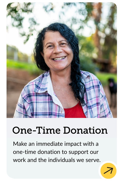 A person in a plaid shirt smiles outdoors. Below, text reads: "One-Time Donation. Make an immediate impact with a one-time donation to support our work and the individuals we serve." An arrow icon points upward.
